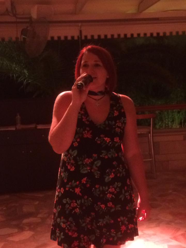 Karaoke Time singer performing live with a microphone